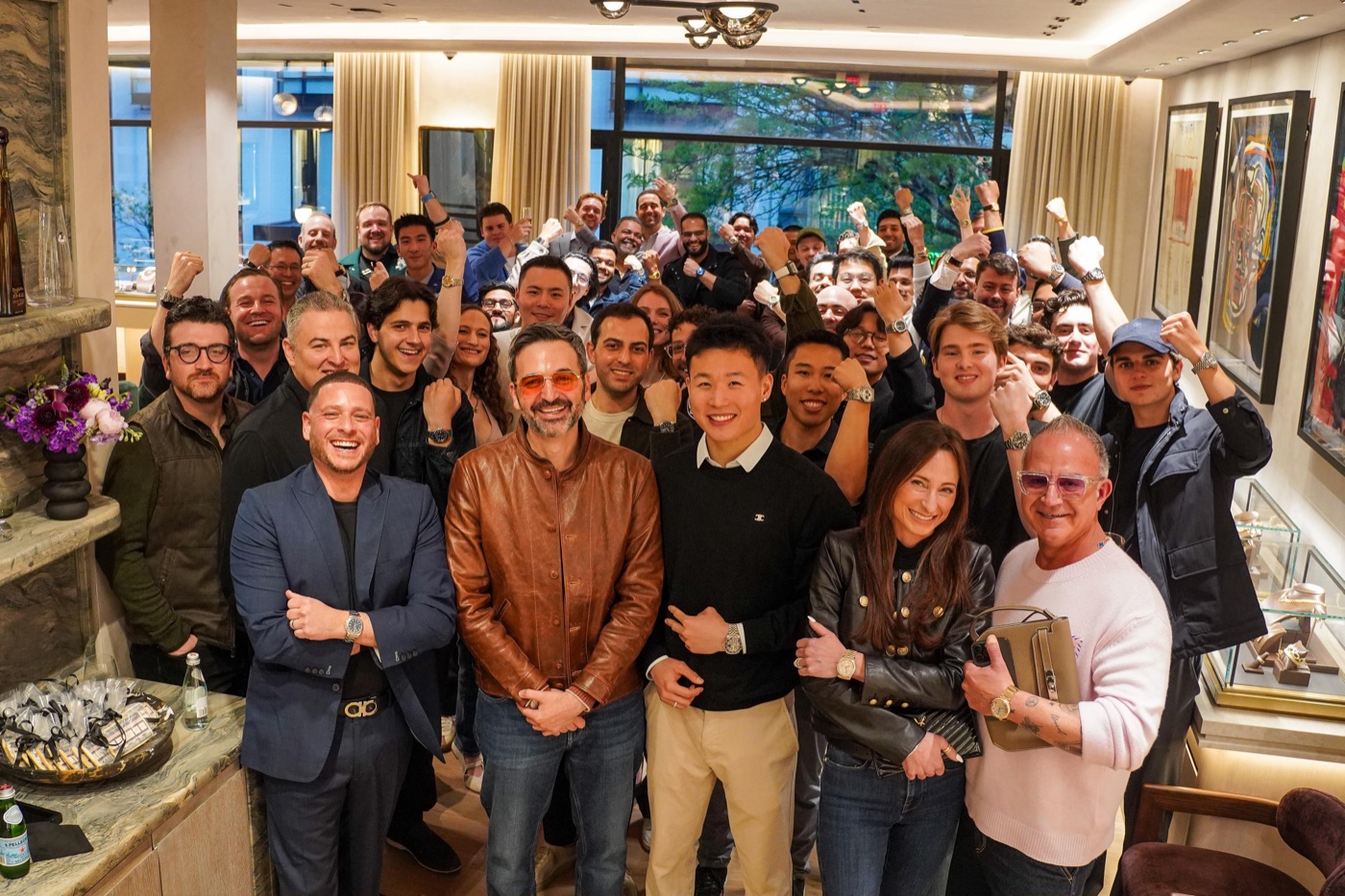 A JZO Club meet-up group photo at an evening boutique gathering
